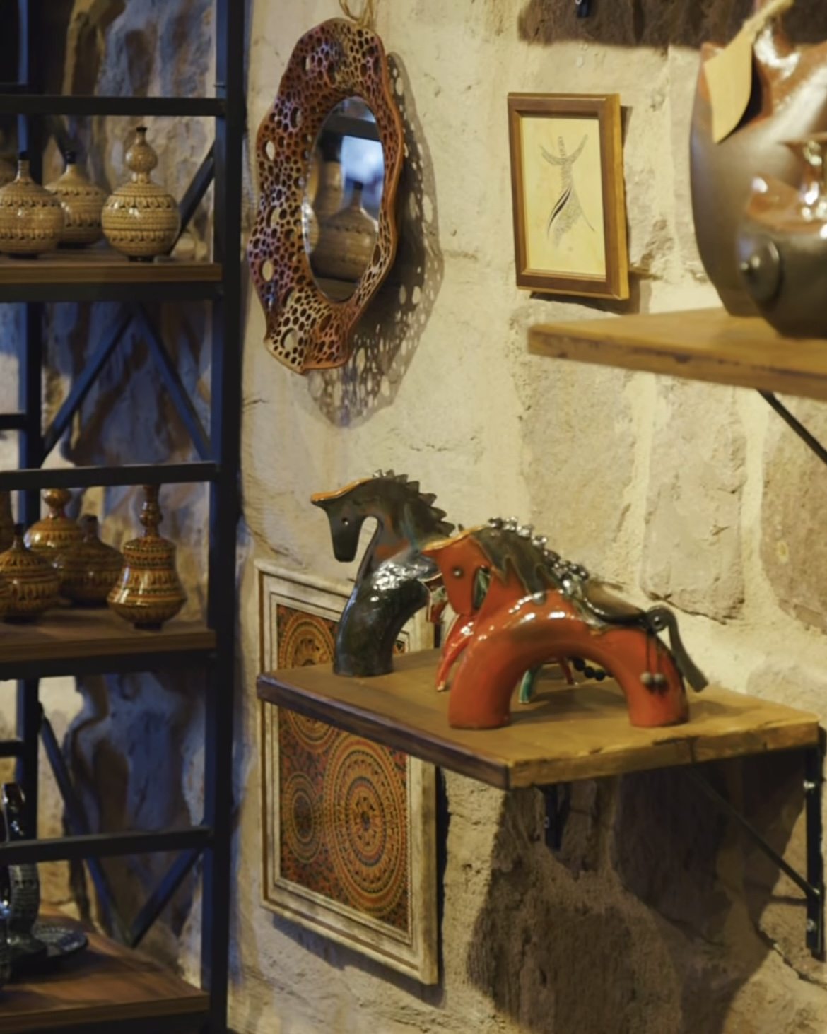 Handmade ceramics displayed on shelves in the The Çanak shop